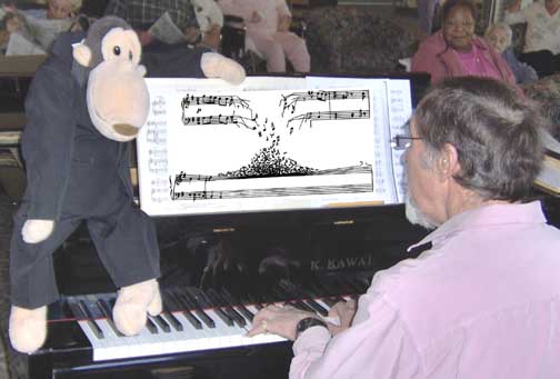 Monkey turns pages of 