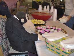 Monkey serves the cupcakes.