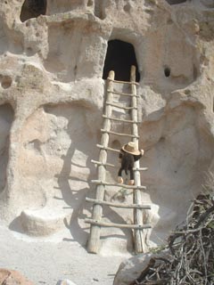 Climbing up into natural cave just like the Bandelierians did.